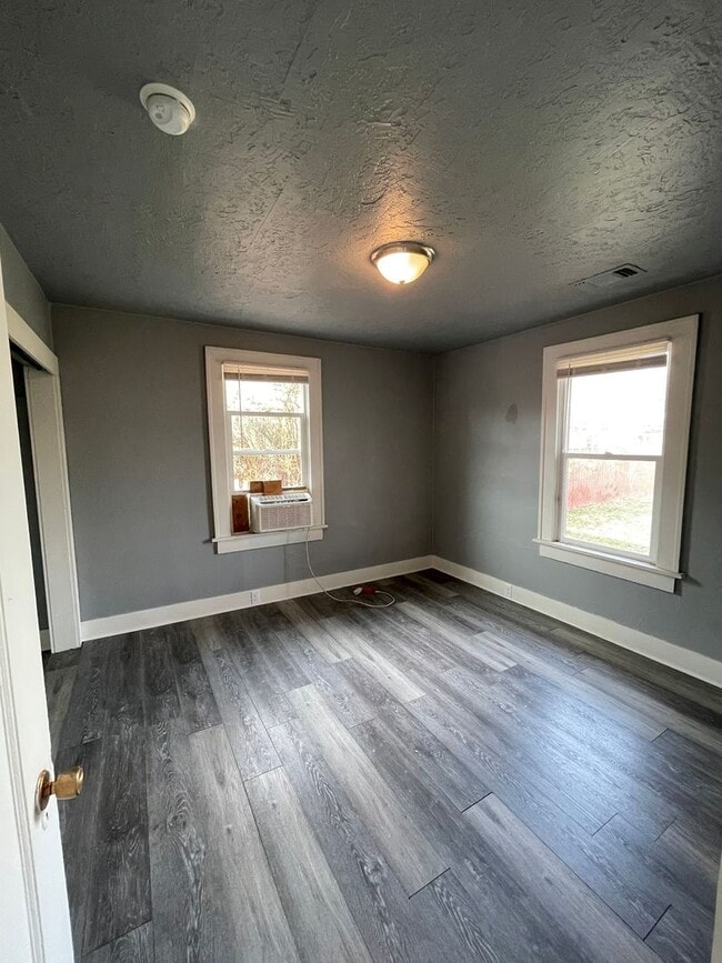 Building Photo - Available Now! Pet-Friendly Updated 2 Bedroom, 1 Bath Home with Fenced Yard & Storage Shed