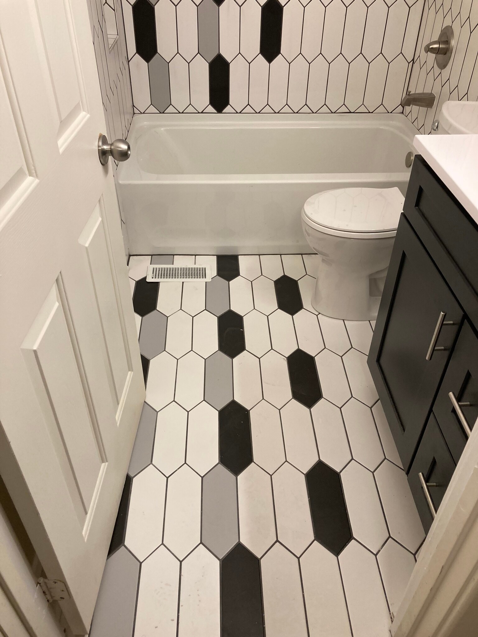 Ceramic tiles on upstairs full bath floor - 1417 N Hamilton Ave