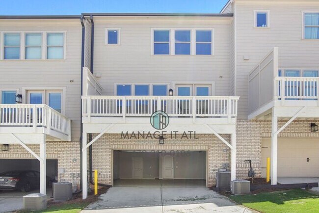 Building Photo - Modern 3-level Townhome featuring 4 bedrooms and 3 1/2 baths