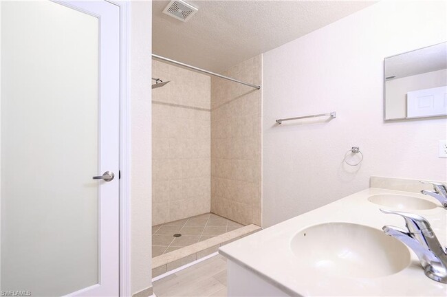 Primary Bathroom - giant shower, double sinks - 13190 Bella Casa Cir