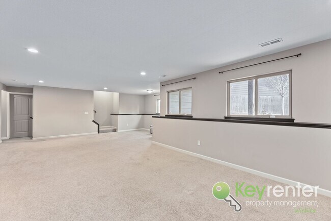 Building Photo - Spacious 4-Bedroom Home with Finished Basement & 3-Car Garage – Derby, KS