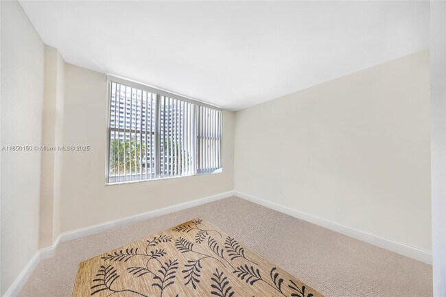 Building Photo - 5600 Collins Ave