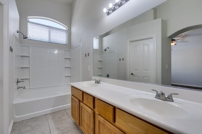 Building Photo - Great townhome in Henderson Gated Community with a 2 car attached garage and backyard