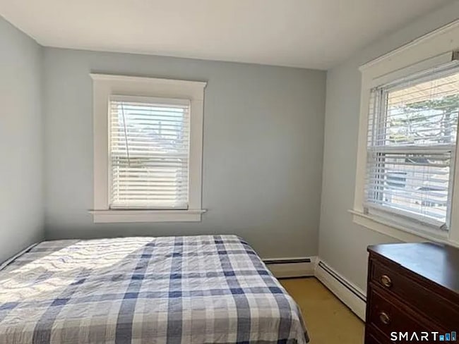 Building Photo - Charming three-bedroom, 1.5 bath fully furnished