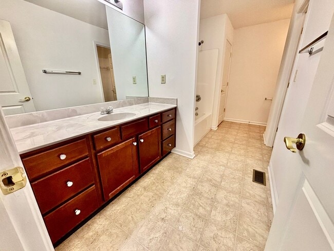 Building Photo - 3 Bedrooms, 2.5 Baths, and a Secret Agent Garage!