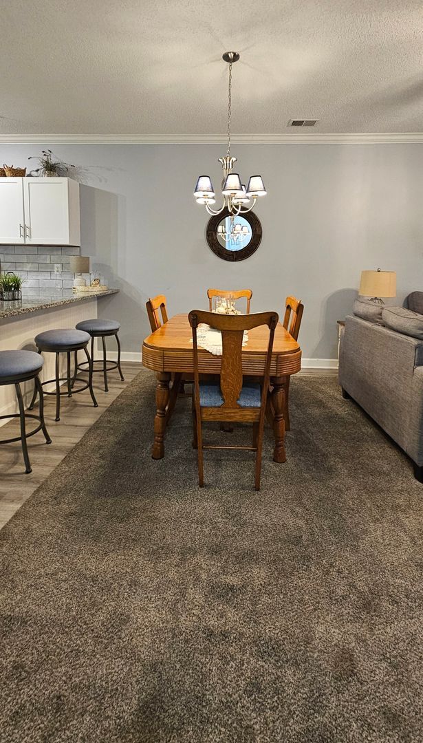 Building Photo - Stunning First-Floor, Fully Furnished Condo with Pond Views