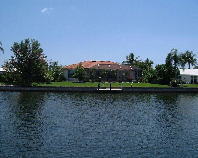 Building Photo - Short Term Rental ** Available 11/1/25 ** 3 Bed/2 Bath Pool Home ** Punta Gorda Isles** $7,500/mo