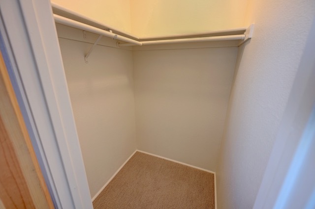 Second bedroom walk in closet hanging space - 2210 Miguel Chavez Rd