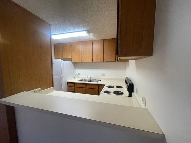 Building Photo - FOR RENT-1314 Kinau ST #204