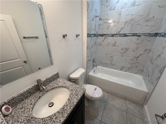 Building Photo - 7145 N Heritage Dr