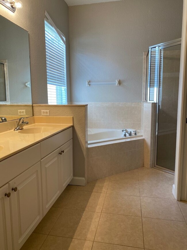 Building Photo - SPACIOUS 3/2 IN SAINT JAMES GOLF COMMUNITY