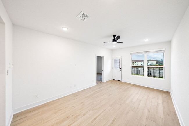 Building Photo - Brand-New, Never-Lived-In Townhome – A San...