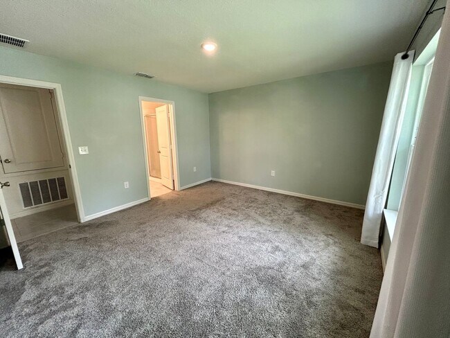 Building Photo - Spacious 3-Bed, 2-Bath Fully Gated Home in...