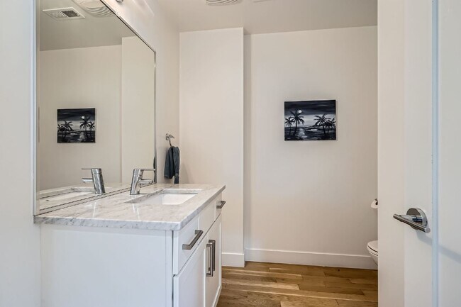 Building Photo - Available NOW! SIX MONTH LEASE - Spacious 3-Bedroom Townhouse with 3.5 Baths in Vibrant Sloans Lake!