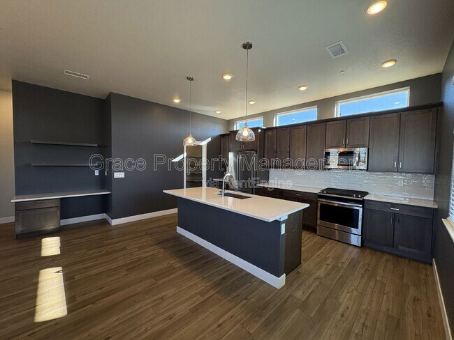 Building Photo - 1585 W 68th Ave