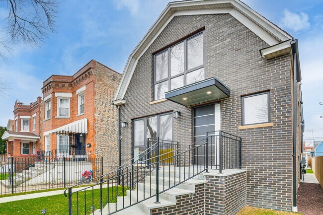 Building Photo - 1034 N Drake Ave