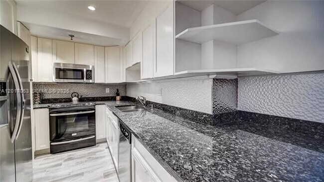 Building Photo - 2401 Collins Ave