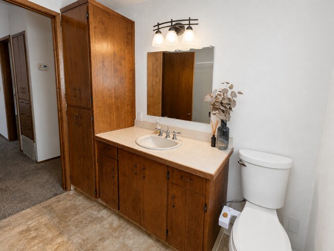 Building Photo - Beautiful Split-Level Home with Fireplace, Deck, Garage, and EV Charger