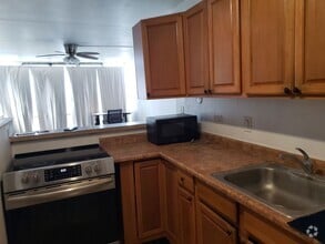 Building Photo - 1 bd. 1 ba. Harbor Lights Unit - Partly Fu...