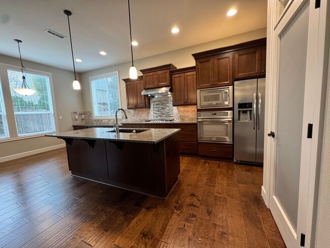 Building Photo - FOR RENT UNFURNISHED: Beautifully maintained 2015 Noyes-built home, 5 bed, 3 bath, 2 car garage w...