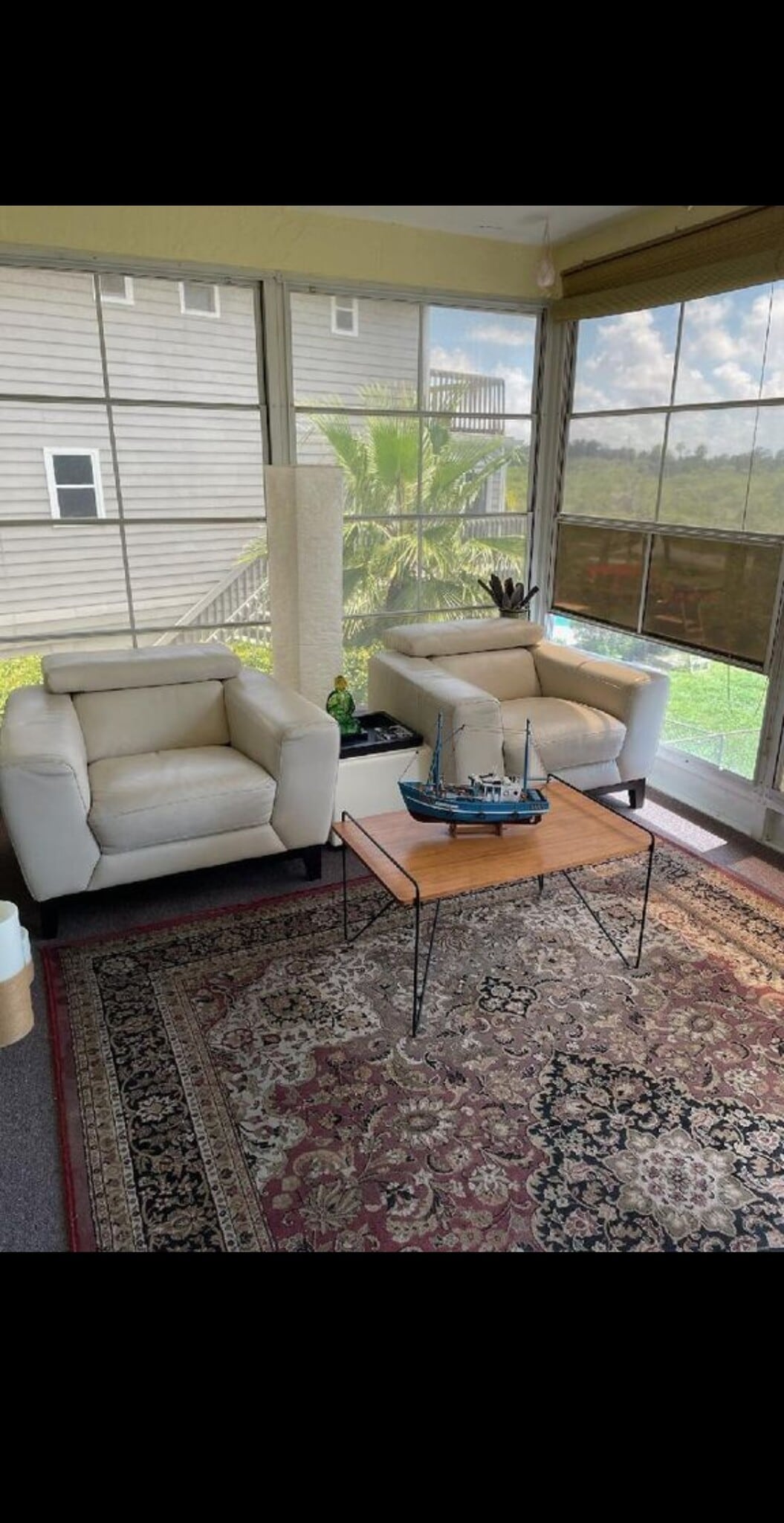 Screened in porch area with Windows you can close, you can walk down the stairs to the backyard or u - 7639 Wells Ct