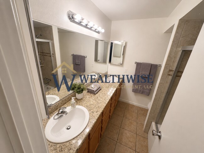 Building Photo - $750/Month Private bedroom in a 2-Bedroom, 2-Bath Condo | Private Parking Included | Minutes from...