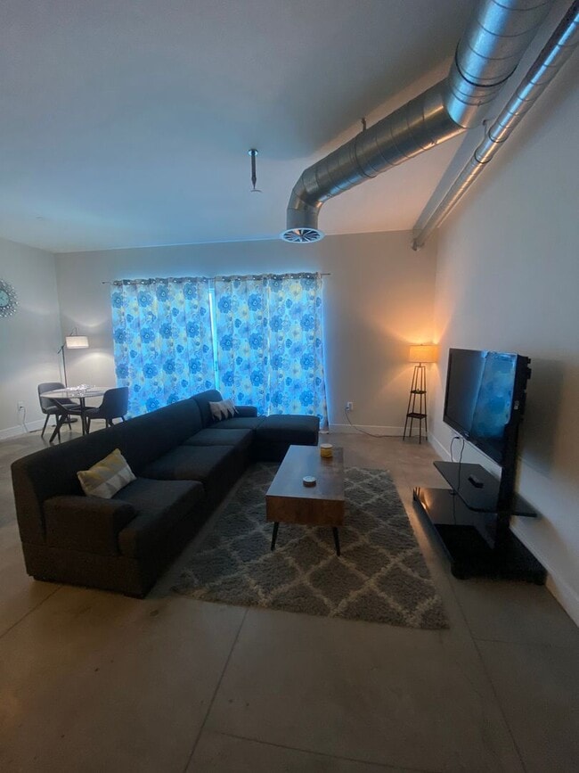 Building Photo - Stunning Fully Furnished Loft with Breatht...