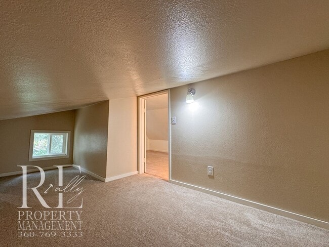 Building Photo - Private Retreat with Expansive Yard & Loft Space