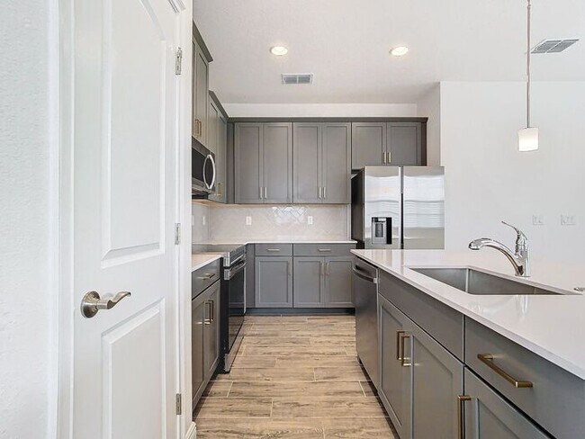 Building Photo - Gorgeous 3/2 Modern Home with a 2 Car Gara...
