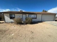 Building Photo - Well-maintained 2-bedroom, 1-bath home located near the 29 Palms Marine Base and Tortoise Rock Ca...