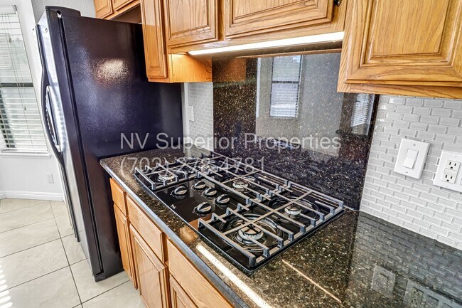 Building Photo - SW The Lakes!!!! Pool!!! Spa!!! Solar Panels!!! Primary bedroom downstairs!!! 3 Car Garage!!!