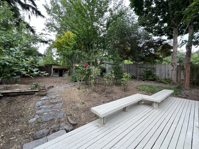 Building Photo - Spacious 3-Bedroom Home with Custom Stone Fireplace, Attached 2-Car Garage & Expansive Backyard i...