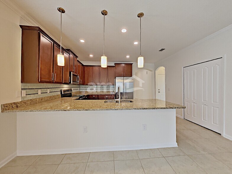 Building Photo - 16176 Magnolia Grove Way