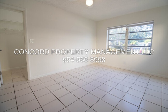 Building Photo - Spacious 2 Bedroom, 1 Bathroom- Pool - Laundry on Site- Fully Tiled- Central AC