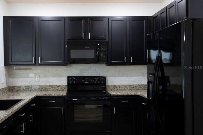 Building Photo - 8089 Pelican Reed Cir