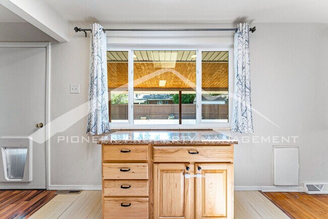 Building Photo - Spacious Home with Fenced Yard and Central AC