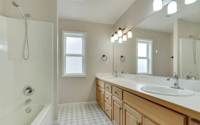 Building Photo - Spacious Four-Bedroom Home with Gourmet Kitchen, Multiple Living Areas, Loft, and Beautifully Lan...