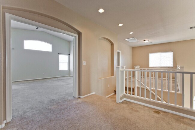 Building Photo - THIS 2 STORY HOME IN A GATED COMMUNITY HAS...