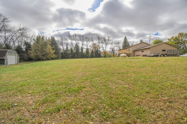 Building Photo - Spacious 4-Bedroom Acreage with Stunning Views Near Hartford — 1.5 Acres of Country Living!