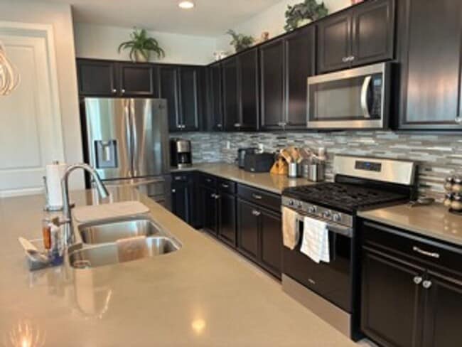Building Photo - STUNNING NEWER HOME- GATED