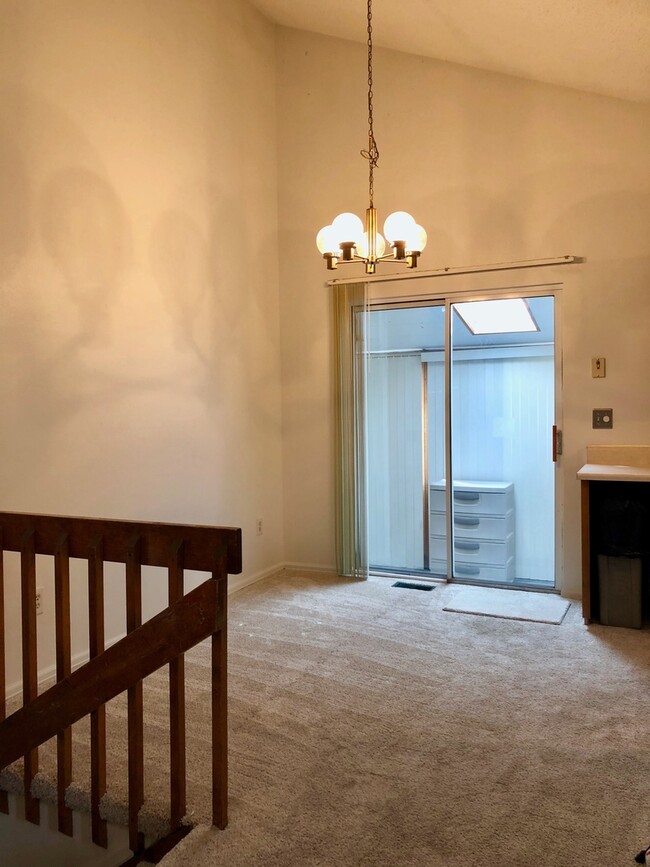 Building Photo - Open Tri-Level Townhome With Tons Of Space...