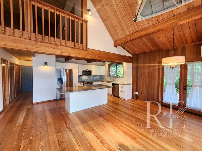 Building Photo - Waterfront Living in Indianola – Dock, Bea...