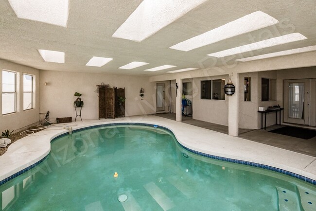 Building Photo - FURNISHED WITH INDOOR POOL