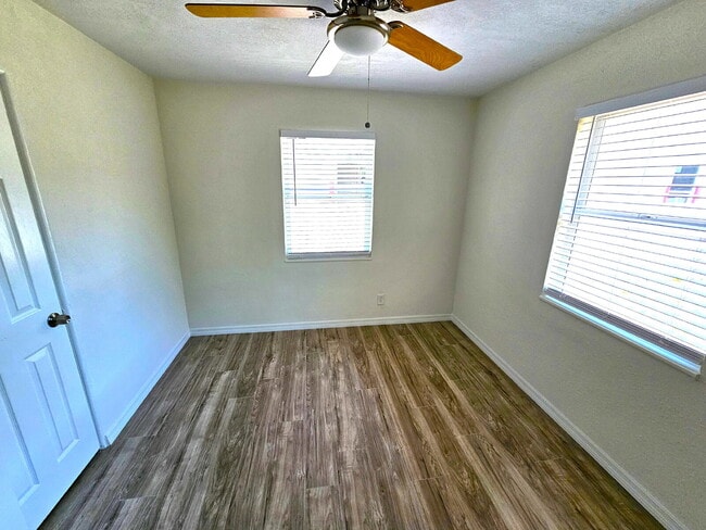 Building Photo - fully renovated 2-bedroom, 1-bathroom home with bonus guest room or office and oversized fenced yard