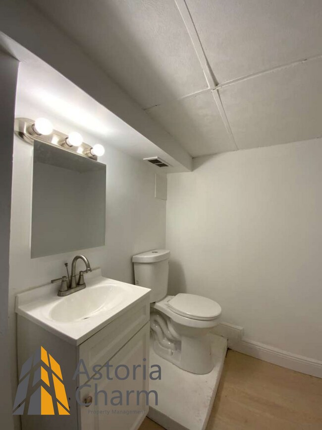 Building Photo - 2 Bed with Finished Basement, Deck off Bedroom, and Backyard