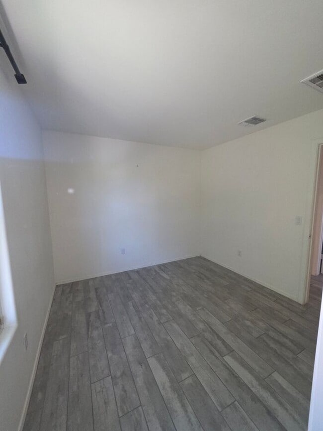 Building Photo - COMING SOON! New 3BR 2 BA Home w/ 2-Car Garage • Stainless Kitchen • Timer-Irrigated Yard in East...