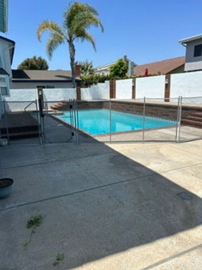 Building Photo - Spacious 4BR Home with Gated Pool, Chef’s Kitchen & 3-Car Garage