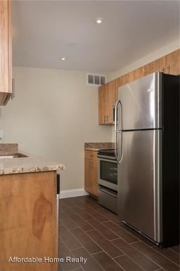 Building Photo - 1002 E Lester St