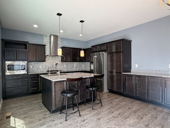 Building Photo - Georgous Three Bedroom Home in Reunion with Private Office, Loft & Chef’s Kitchen!