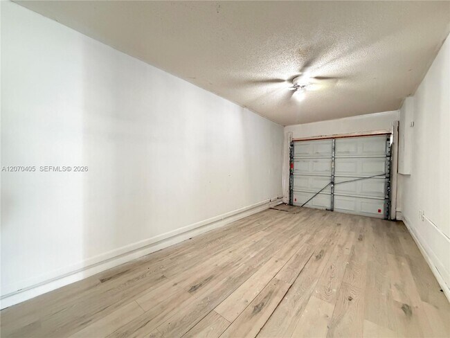 Building Photo - 9850 W Heather Ln